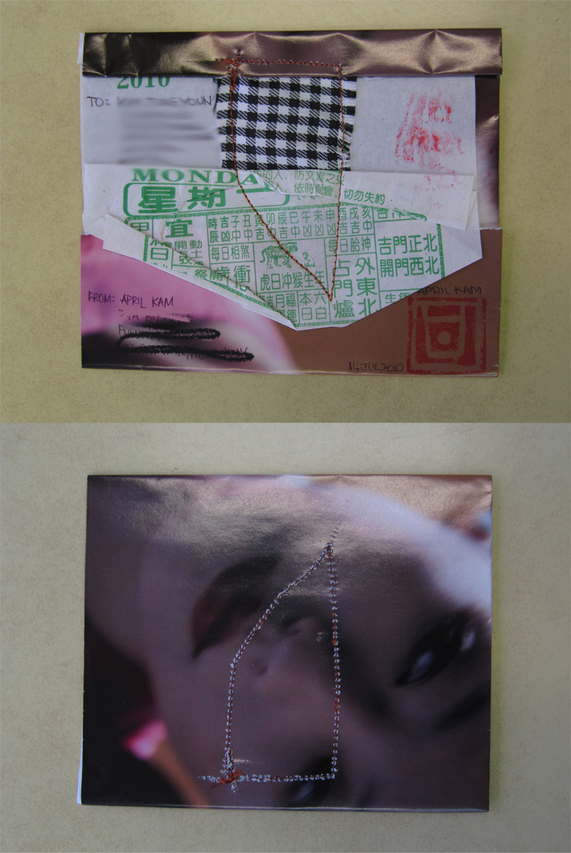 Gingham and a green almanac page stitched to an envelope, and below it a dark blurred face outlined in thread