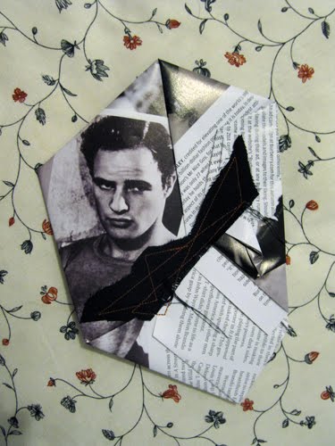 A black and white portrait of a young man half covered by columns of printed text and a black band