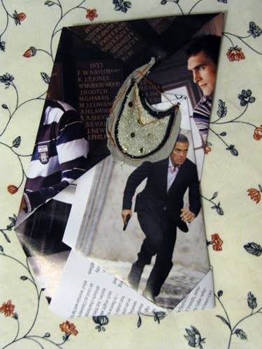 A man in a suit walking, a gold clutch bag and striped shirts folded in around him