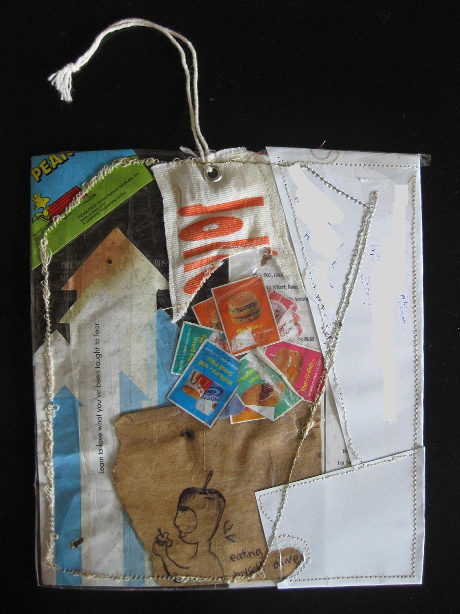 The other side, pale stitched cloth carrying postage stamps, a torn brown paper patch and a printed figure